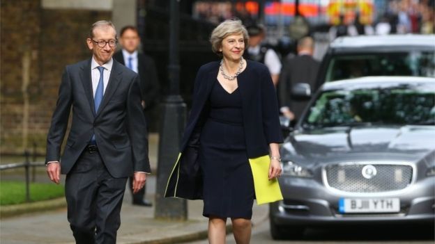 Mrs May with her husband Philip arriving at Downing Street